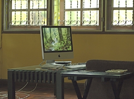 iMac on glass table