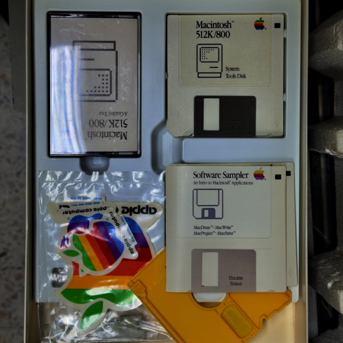 Early Macintosh + diskettes and casette